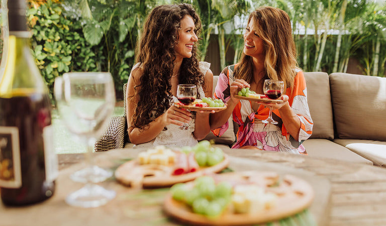ladies drinking wine and laughing